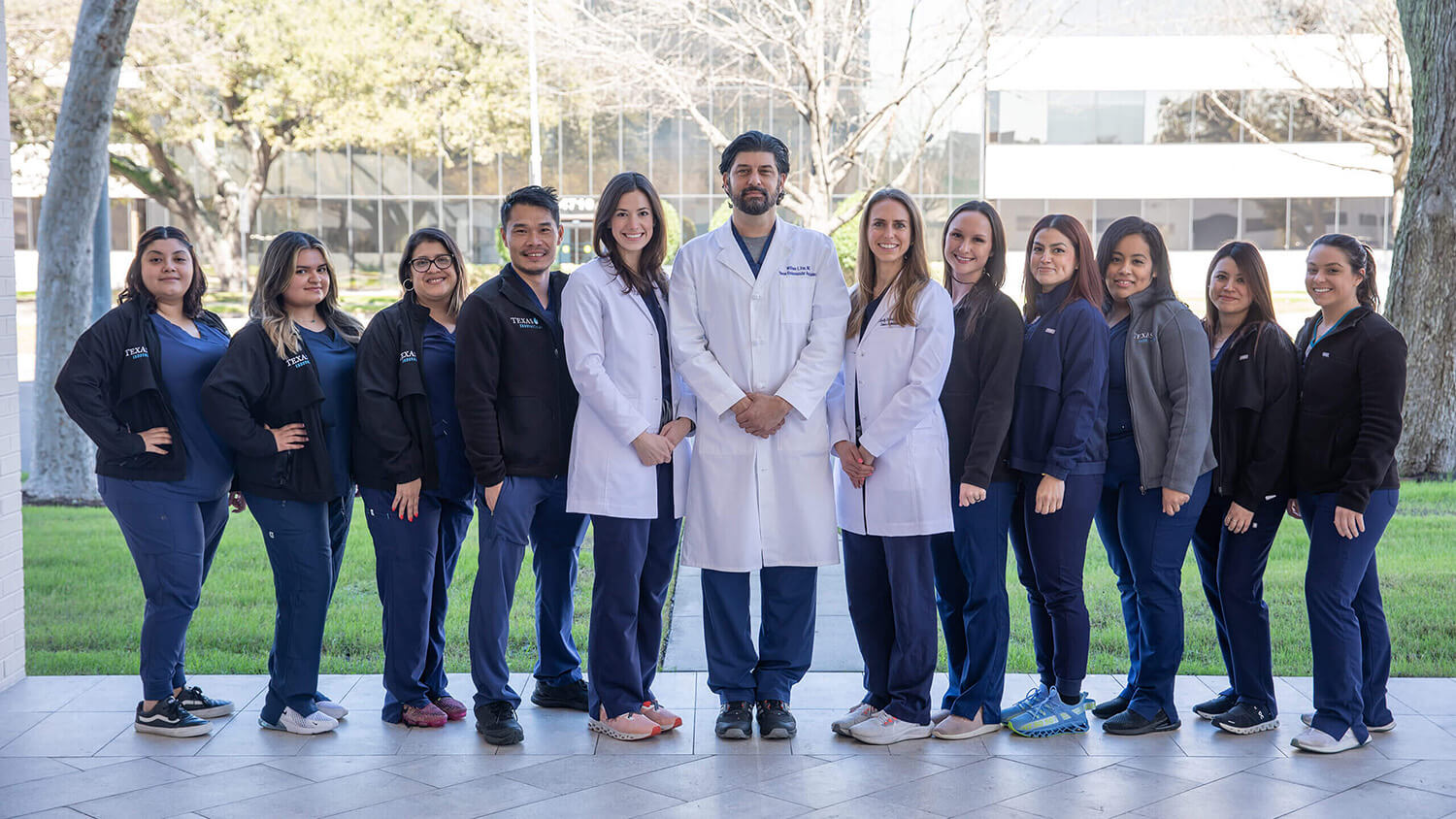 group photo of providers at Houston office