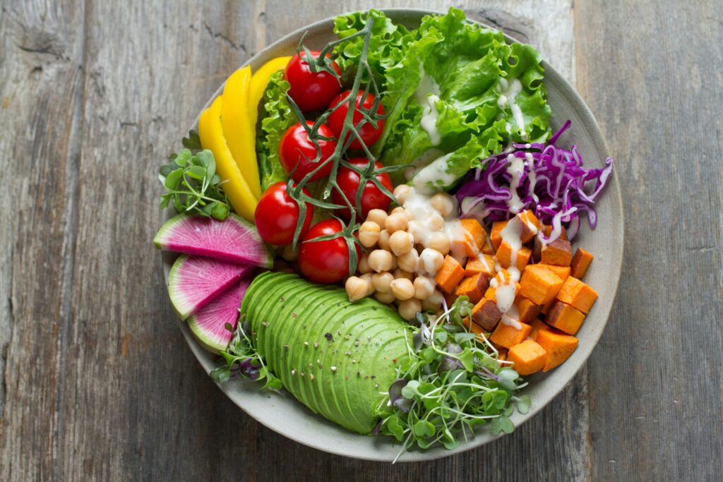 a plate of fruits and vegetables 