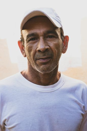 a man with a baseball cap